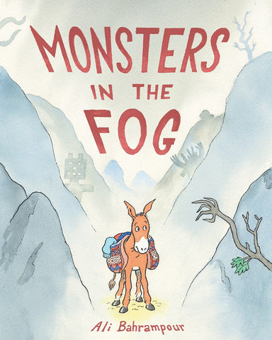 Cover of Monsters in the Fog: Hakim the brave donkey stands in a mountain pass, looking warily at shapes in the fog around him. 