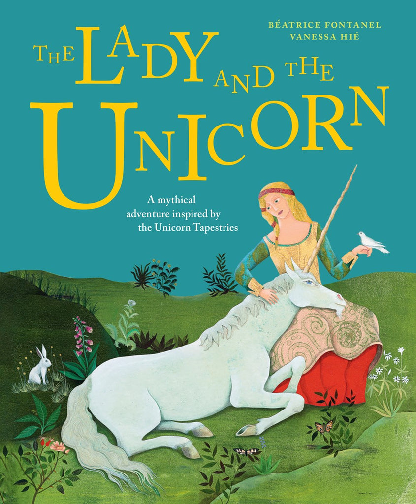 Cover of The Lady and the Unicorn, showing: you guessed it, a lady and a unicorn. She's blonde and dressed in a medieval style, The unicorn is gentle and noble. There are also bunnies