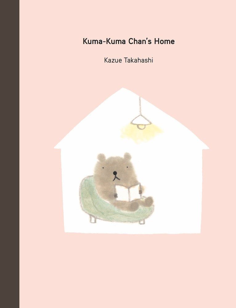 Cover of Kuma Kuma Chan's Home: Kuma-Kuma Chan reads a book in a chair