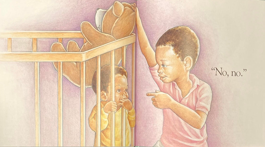 Image of an internal spread from Baby Says by John Steptoe. Shows the older brother dropping the teddy bear into his younger brother's crib. Text reads "No, no."